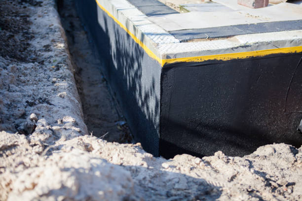 Professional Waterproofing technician working in Alamo, GA